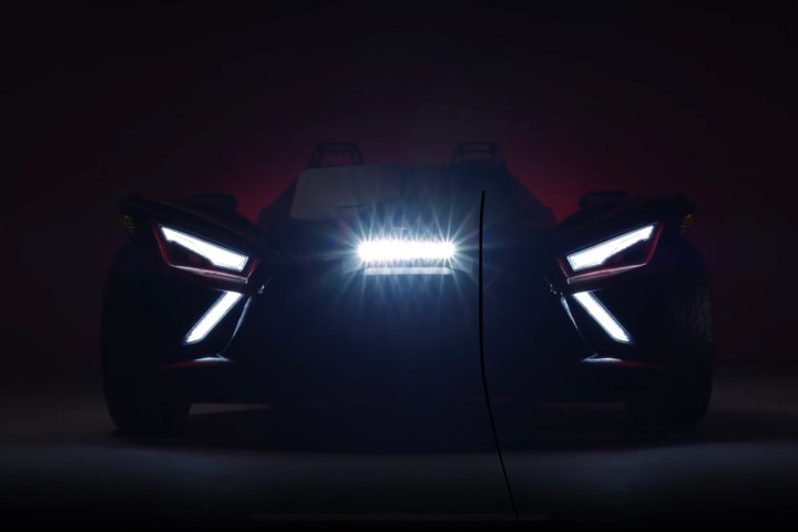 a person sitting in a dark room