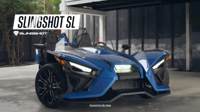 a motorcycle parked on the side of a road