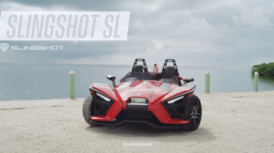 a motorcycle is parked on the beach